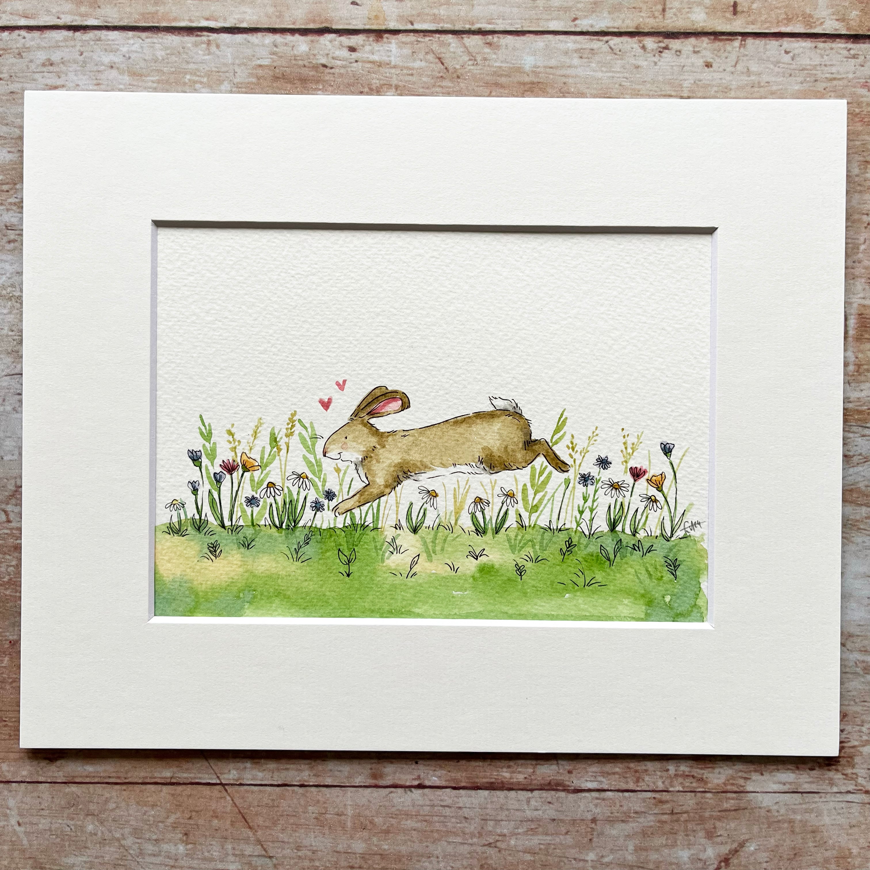 Rosalie the rabbit leaping through wildflower meadow - original illustration